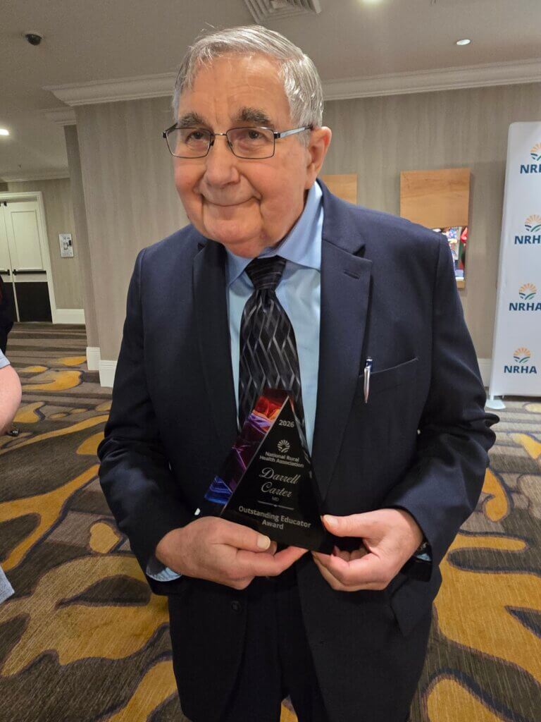 CALS co-founder Dr. Darrell Carter with Outstanding Educator award at NRHA conference 2026
